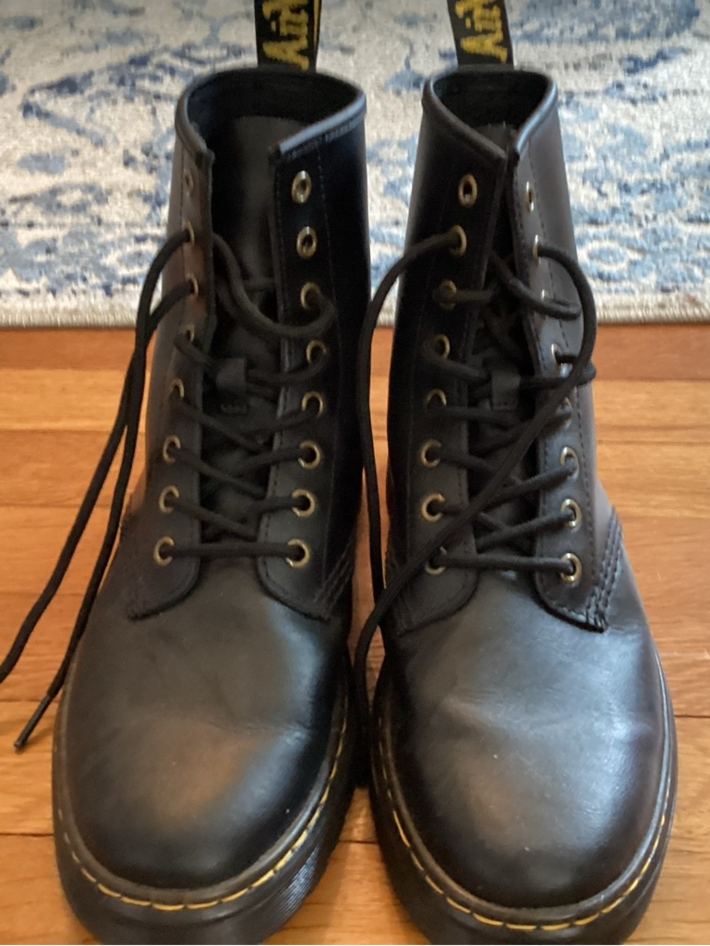 Dr. Martens Black Leather 8-Eye Lace-Up Boots with Yellow Stitching